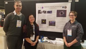 Towson Professor James Overduin with students at 231st AAS meeting.