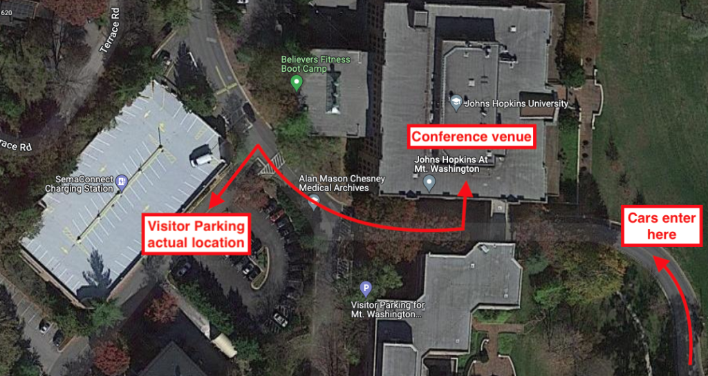 Annotated google image showing visitor parking and conference venue relative locations.