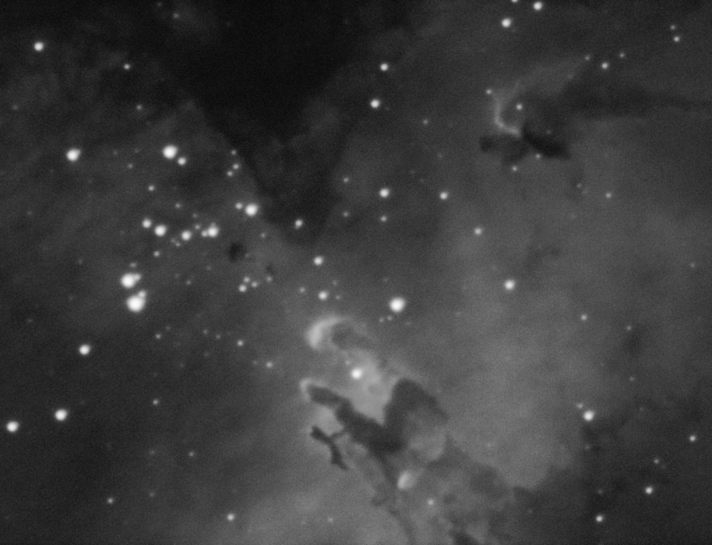 Monochrome image of eagle nebula through H-alpha filter